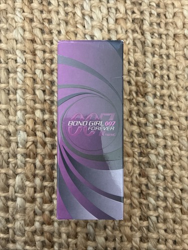 Rare avon bond girl - avon,