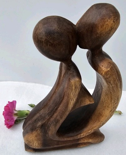 Hand carved wooden lovers - hand,