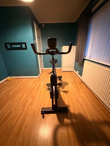 Exercise bike with floor mat - with,