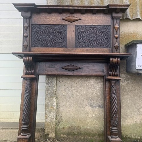 Large carved timber fire - carved,