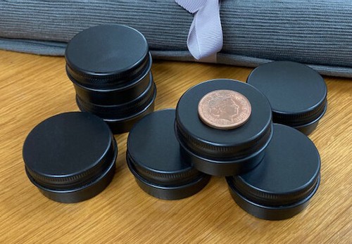 Black round metal tin - round,