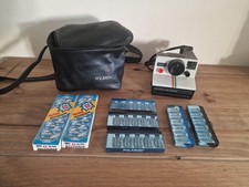 Polaroid Land Camera 1000 that uses SX-70 integral film. Bundle