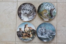 FOUR BIG CATS PLATES.
