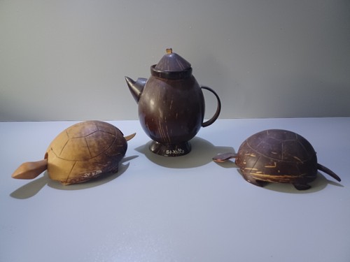 Hand carved coconut shell - hand,