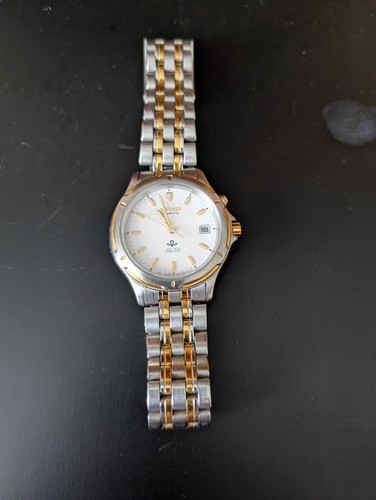 Seiko kinetic watch - sq, 50