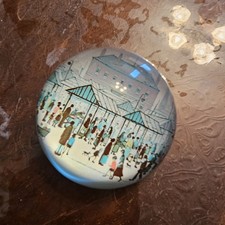 glass paperweight featuring