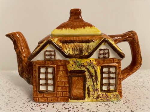 Vintage cottage teapot hand - cottage,