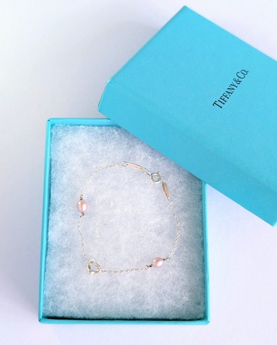 Tiffany and pearls by - tiffany, co.