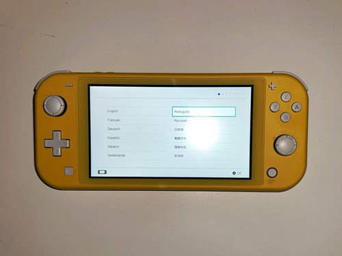 Nintendo switch lite yellow - nintendo,
