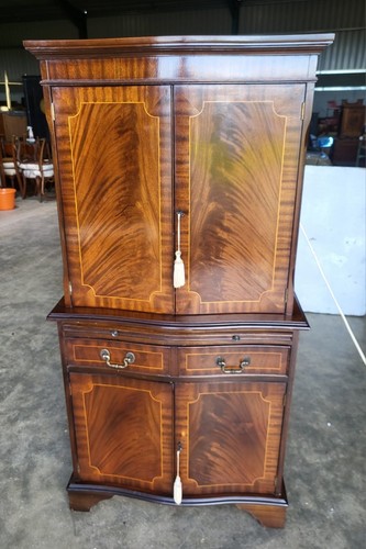 Antique repro bow front inlaid