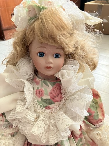 Porcelain doll with - with, stand