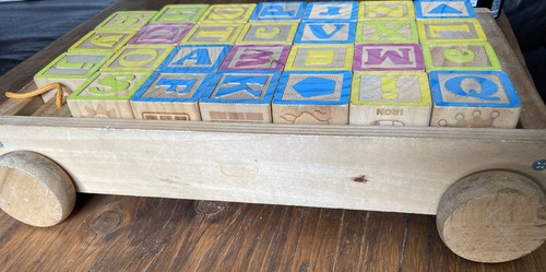 Pull along cart with learning - along,
