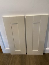PAIR OF OFF WHITE KITCHEN DOORS  300mm X 720mm.    STOCK DZ707