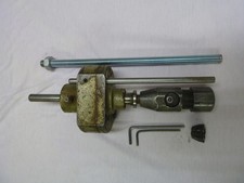 auto reverse tapping head