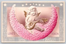 Valentine~Cupid On Pink Flower