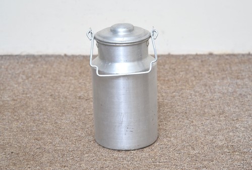 Vintage old aluminium milk