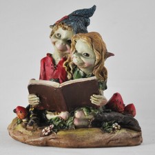 Pixie Couple Reading Magical