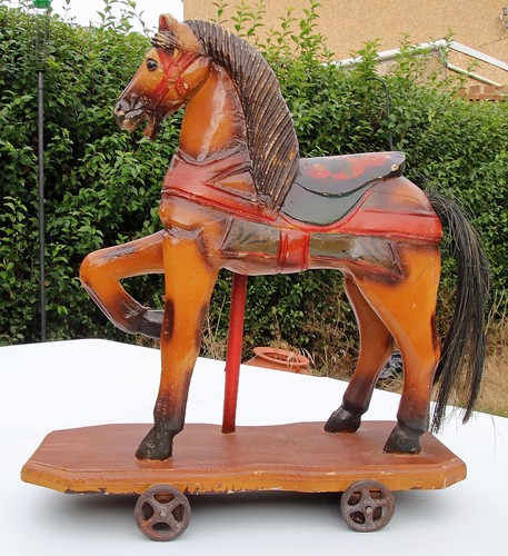 Old wooden horse - wheels,