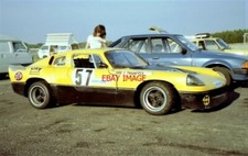 PHOTO  JULIE THWAITES STANDS BY HER 998CC HILLMAN IMP-ENGINED DAVRIAN MK8 IN WHI
