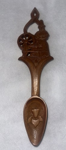 Mike davies hand - carved, wooden