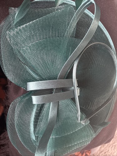 Dark green fascinator worn - dark,