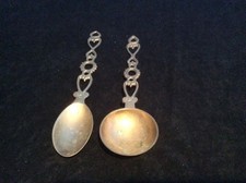 A Pair Of Antique Brass Love