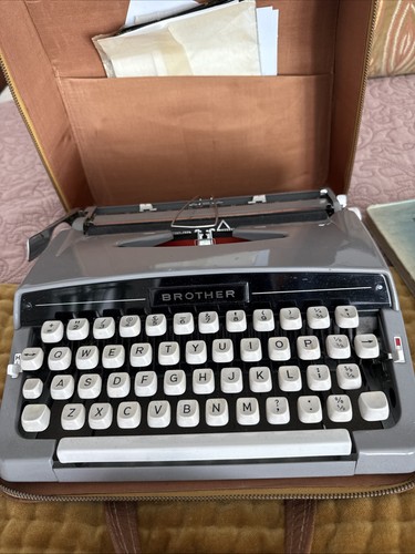 Vintage typewriter with case - with,