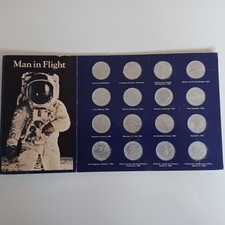 Man in Flight - Shell Coins -