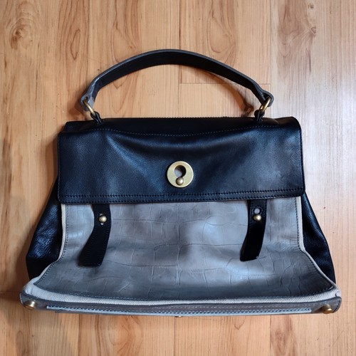 Yves saint laurent muse - laurent,