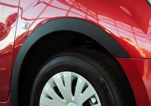 Wheel arch trims front - , rear