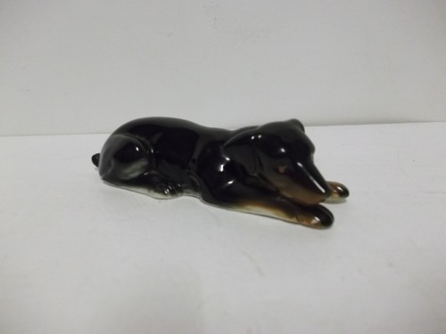 Vintage laying down doberman - down,