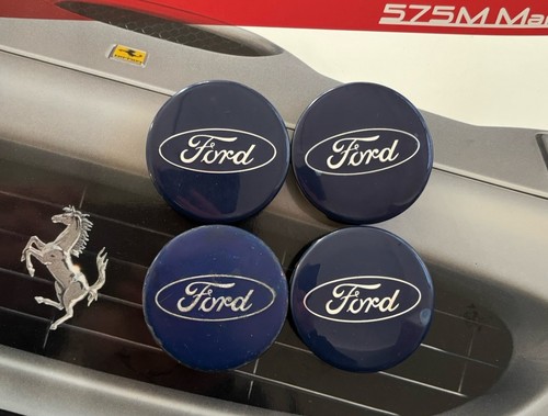 Four genuine ford centre wheel - ford,