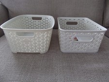 2 x white small storage baskets. Excellent condition. 1 Curver, 1 Hobby
