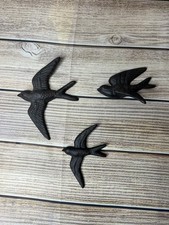 Cast iron swallow wall - swallow, art