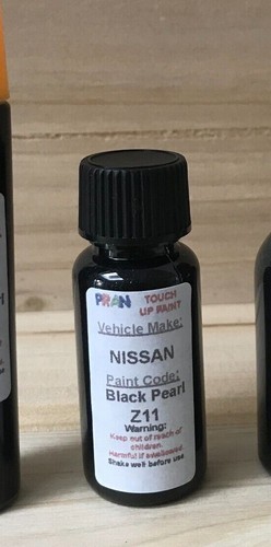 Nissan black car - black,