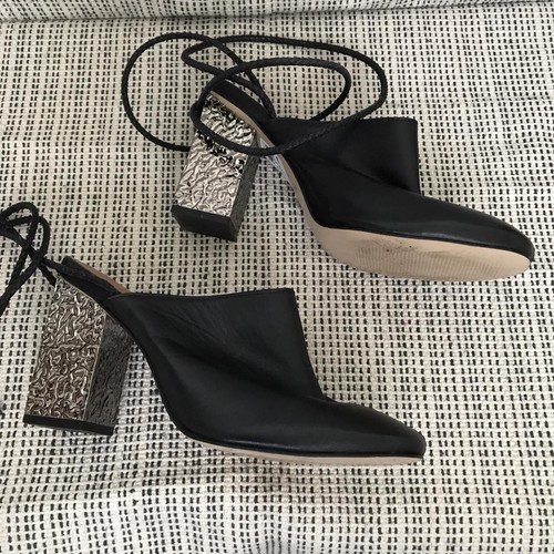 Black leather mules with - , metal