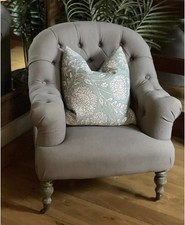 Grey upholstered button back