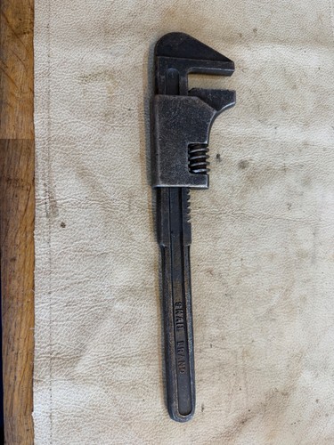 Vintage snail monkey - monkey, wrench