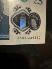 A 5 pound note serial number