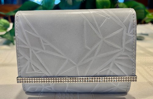 Swarovski embossed coin - swarovski,