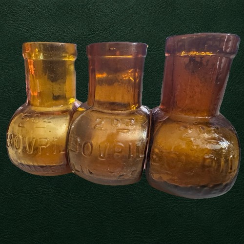 Antique bovril bottles - bovril, amber