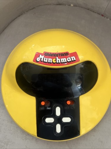 Grandstand munchman handheld - grandstand,