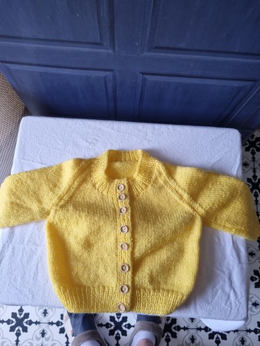 Hand knitted toddlers cardigan - hand,