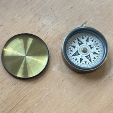 Brass Cased Floating Card