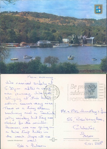 Lakeside with boats and - , hills