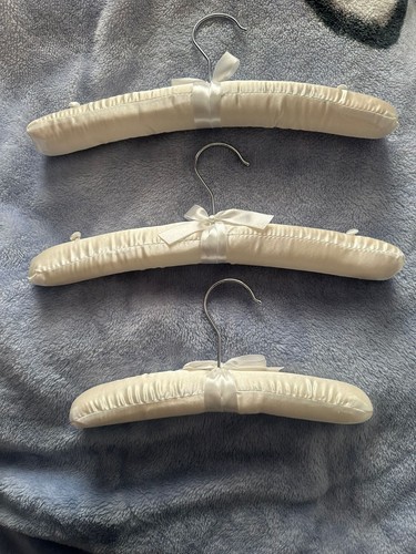 Three padded hangers - three,