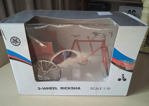 Vintage wheel red ricksha - 3-wheel,
