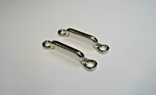 Door check strap brackets - 2,