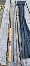 A CENTURY ELIMINATOR IMX FLY ROD IS IN GOOD CONDITION 12FT RATED APROX #8 LINES