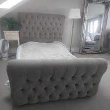 4ft Small Double bed frame French Style.  Upholstered. used once. 